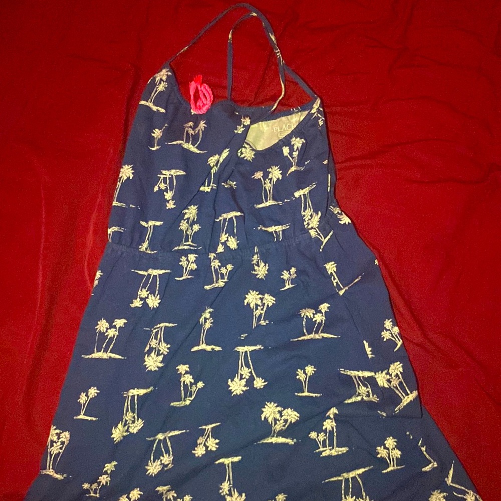 Children’s place L/G 10-12, it is a very delicate dress to wear when it’s hot !